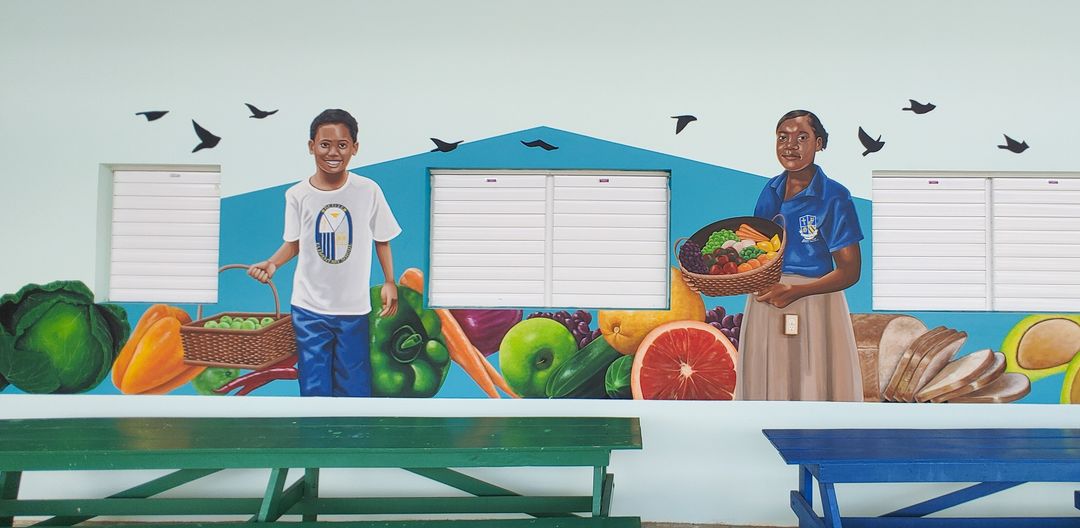 Mural on the BHS/BES campus depicting students carrying fruit and vegetable baskets
