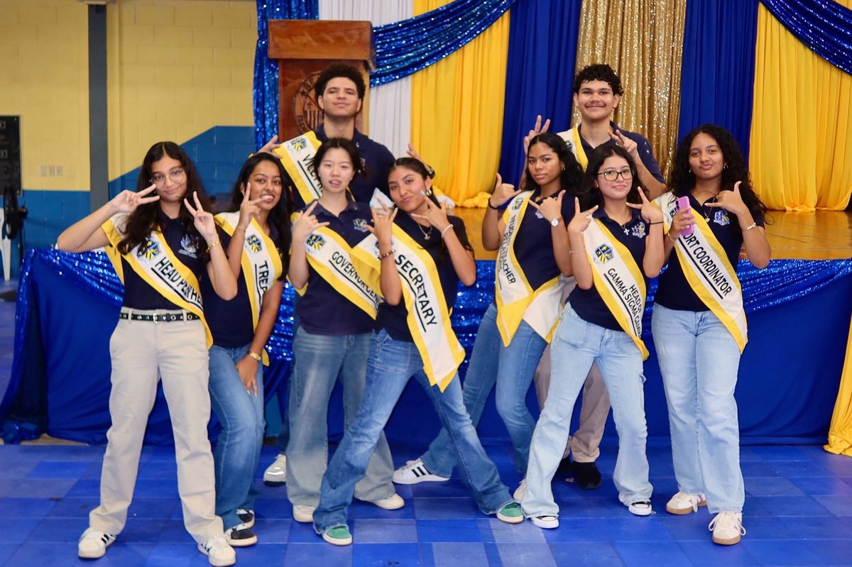 BHS student council with sashes at a campus assembly
